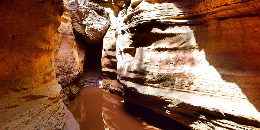 Spectacular landscape of Hell’s Gate National Park showcasing a deep canyon and flowing water.