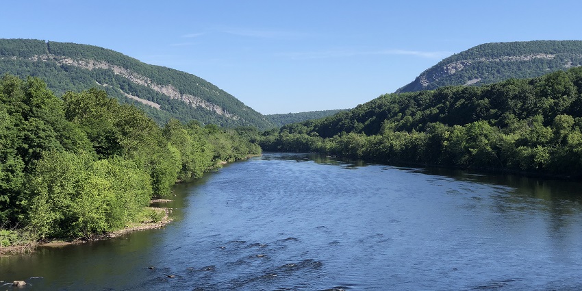 Delaware Water River passing through small hills and hiking trails at a distance
