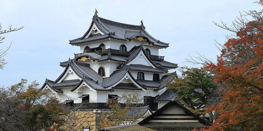 Hikone Castle with scenic autumn backdrop is a historic spot to explore in October Japan.