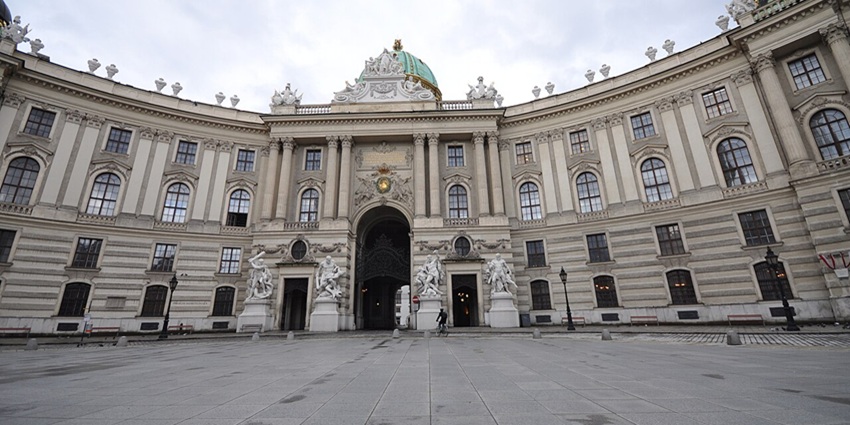 Front view of Hofburg Imperial Palace showcasing grand Baroque architecture in Innsbruck.