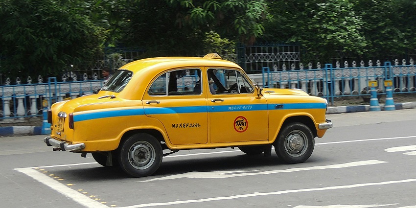 A yellow taxi for local rides to city attractions and other places which is convenience