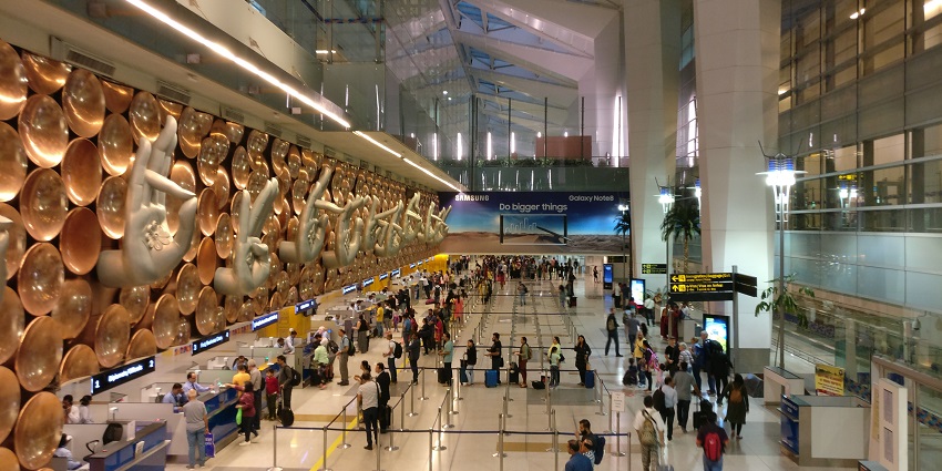 Passengers at Delhi Airport, the nearest airport to De Adventure Park in Haryana.