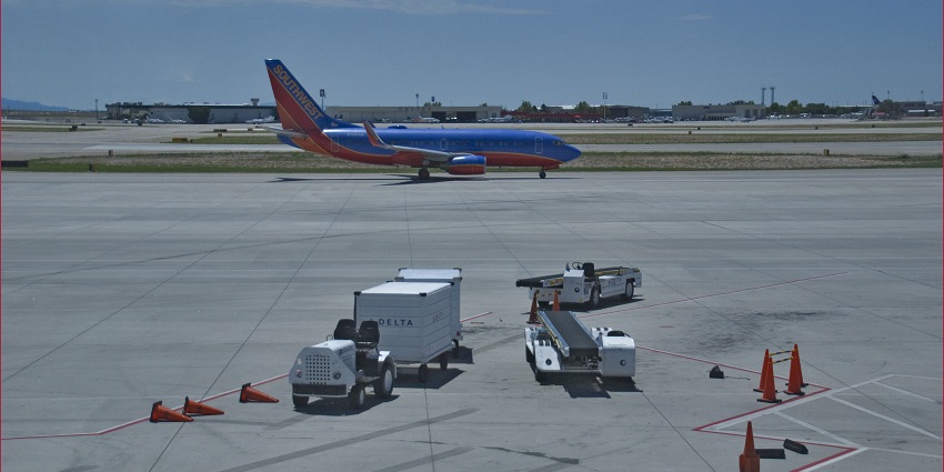 The Albuquerque International Sunport (ABQ) terminal can be seen from the tarmac.