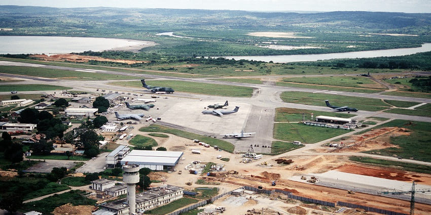 Moi International Airport from above with multiple aircraft, airport terminal and buildings