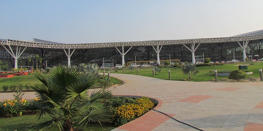 Image of Raipur International Airport entrance gate and garden during day time