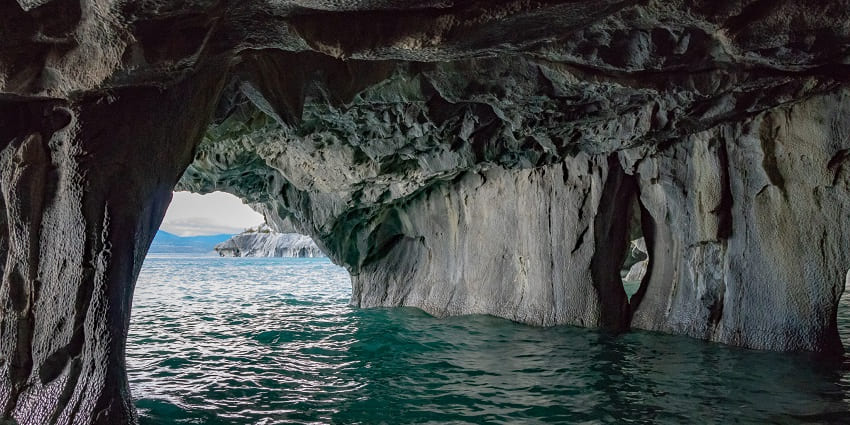 The Entrance of Marble Caves submerged in sea