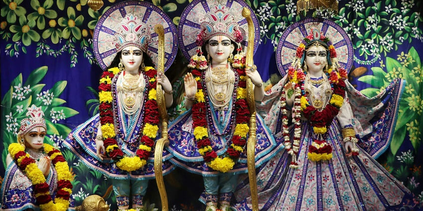 Image of Lord Krishna in an ISKCON temple - Hindu Figurines Decorated with Flowers
