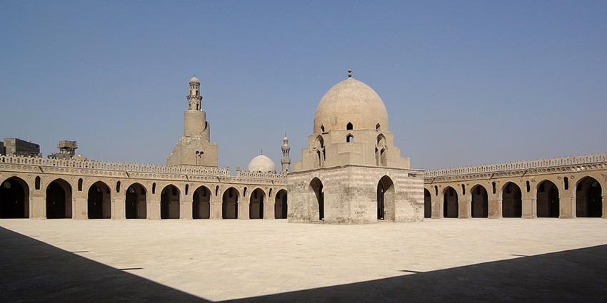 A view of the Ibn Tulun Mosque showcasing its spacious courtyard surroundings.