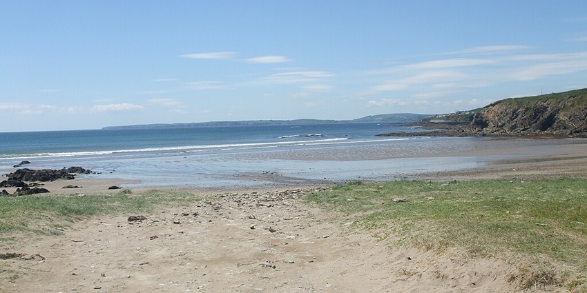 An image of Inch Strand, one of the best beaches in Ireland, showcasing its long coastal views