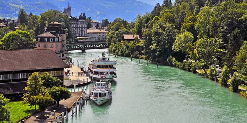 Picturesque town nestled between two lakes and majestic mountains