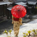 Image of a Japanese woman with traditional attire in a countryside - Japan travel guide