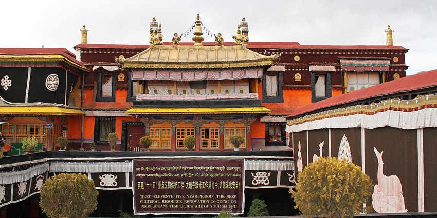 View of the Jokhang Temple with intricate architecture.