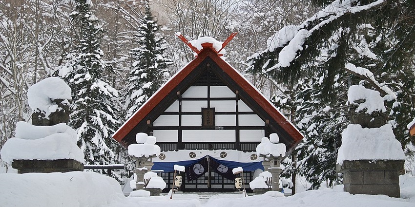 Jozankei Onsen in winter offers serene hot springs amidst snowy landscapes.