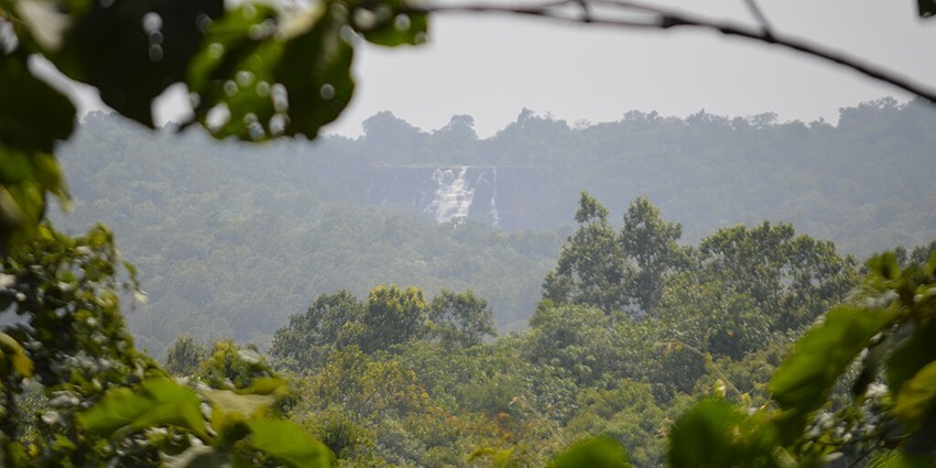 A distant view of water cascades in Kanger Valley National Park in Bastar, Chhattisgarh