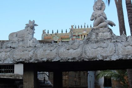 Kanjanur Temple with intricate stone carvings, sculptures, and vibrant details.