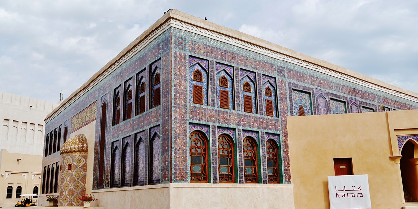 Qatar mosques with intricate blue tiles and calligraphy.