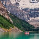 An image of a kayaker gliding through the calm waters in a famous kayaking spot in Canada.