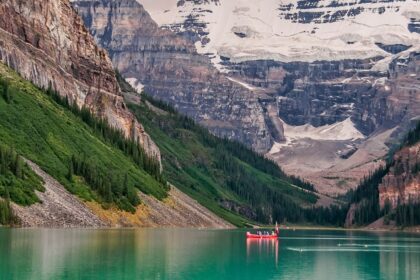 An image of a kayaker gliding through the calm waters in a famous kayaking spot in Canada.