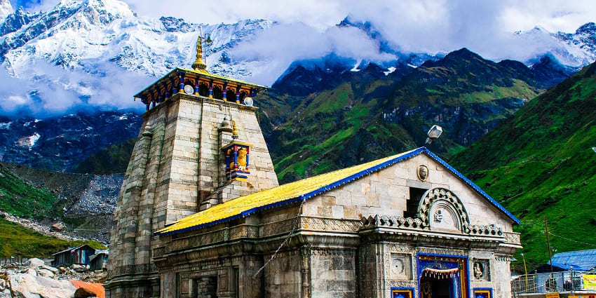 Sacred temple in Uttarakhand, set against stunning Himalayan scenery.