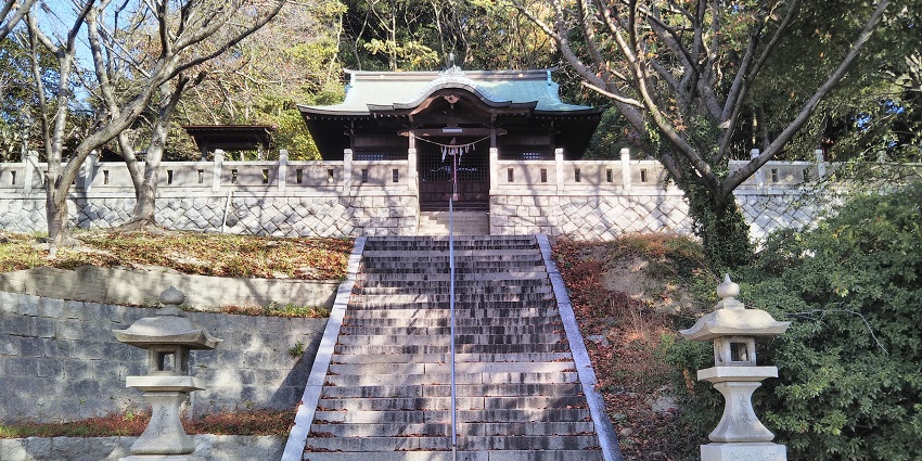 Shinto shrine dedicated to water deities nestled in the mountains.