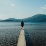 An image of a man in Killarney National Park, with Tomies Mountain in the background.