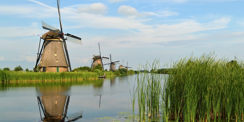 Admire the UNESCO-listed windmills at Rotterdam, a place to visit in Netherlands.