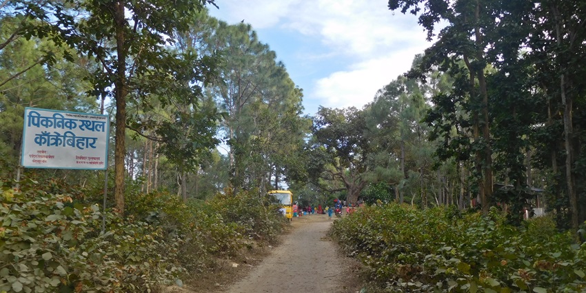 Picnic spot at Kakre Bihār, greenery and seating by water in scenic area springs