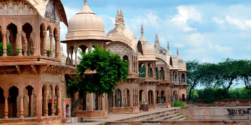 Kusum Sarovar, a tranquil water tank surrounded by stunning architecture.