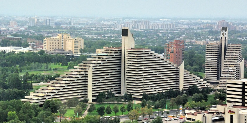 A view of the stunning Olympic Village in Montreal, featuring twin apartment towers.