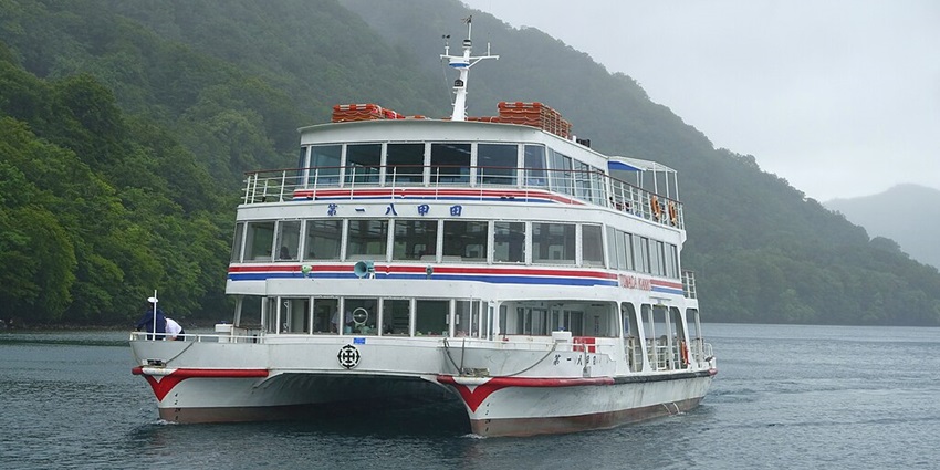 Cruise over Lake Towada, Aomori, offering scenic views and tranquility.