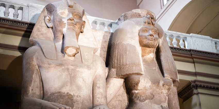 A pair of statues on display in the Grand Egyptian Museum have been visibly restored.