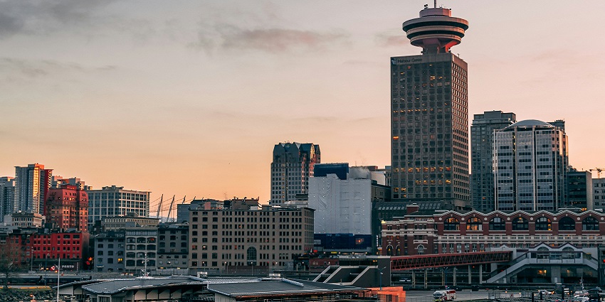 A picture of the stunning Vancouver Art Gallery through the park and city skylines.