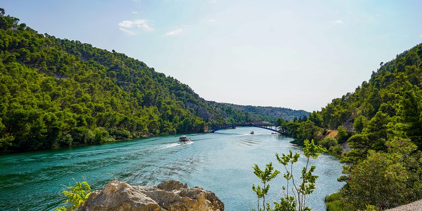 An image of Krka National Park showcasing its stunning waterfalls and lush landscapes.