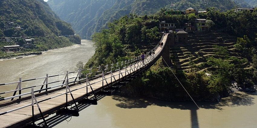 It offers scenic views, cooler weather, and Himalayan adventure.