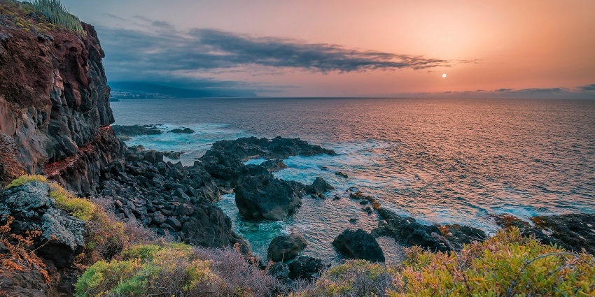 Volcanic landscapes, featuring African-European culture off the northwest coast of Africa.