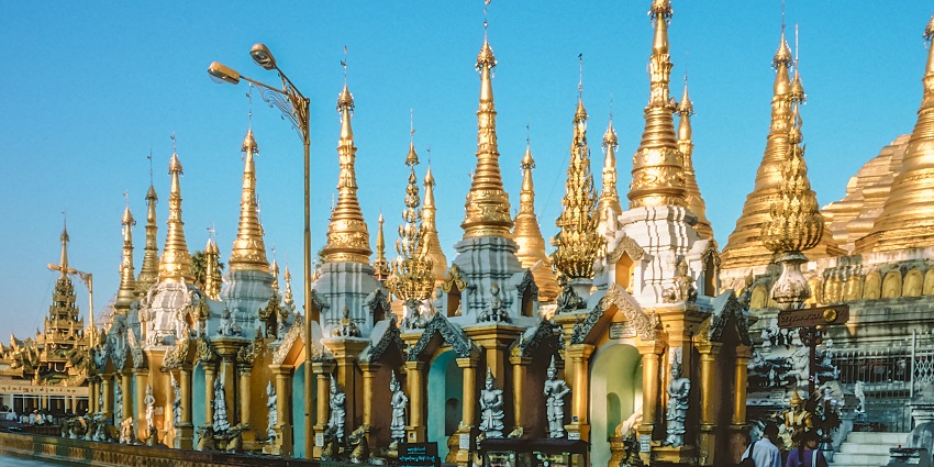 Yangon’s blend of colonial architecture, spiritual sites, and vibrant markets.