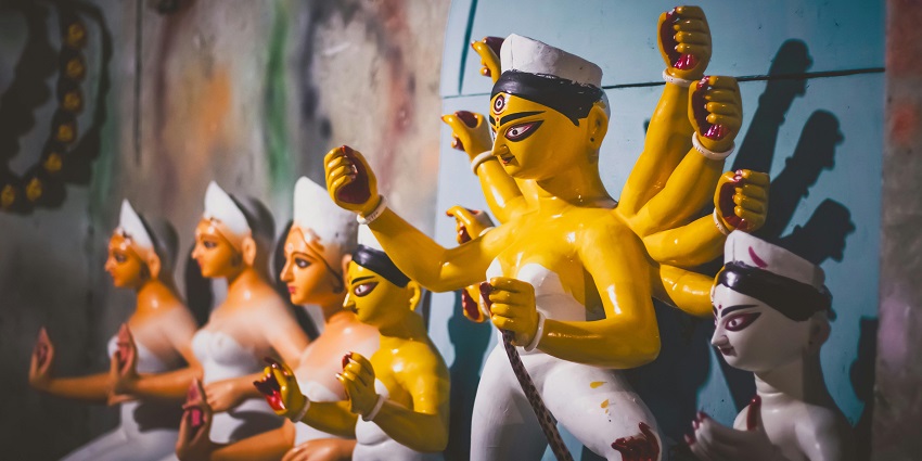 A picture of the grand entrance of Durga Museum Kolkata with vibrant decorations.