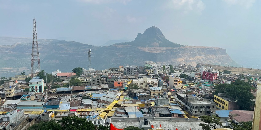 Scenic city surrounded by the Western Ghats and the Godavari River in Maharashtra.