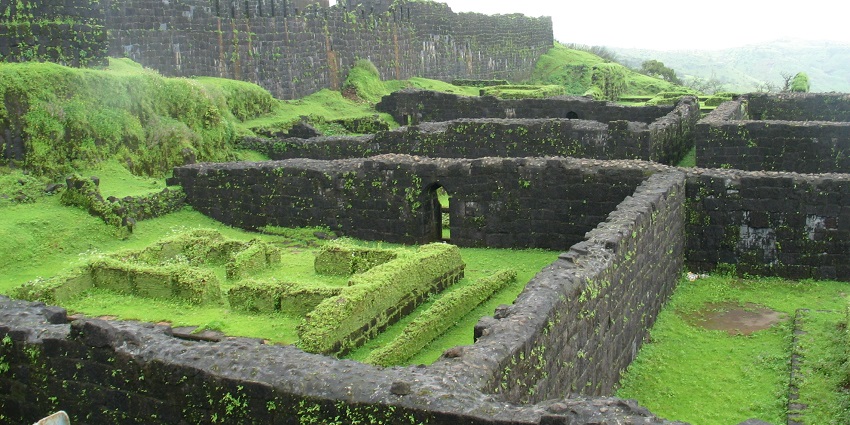 An image showing statue of Shivaji at Raigad Fort, a famous tourist spot in Maharashtra.