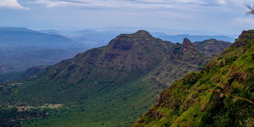 Rift Valley viewpoint and other hills at a distance covered in greenery in Samburu.
