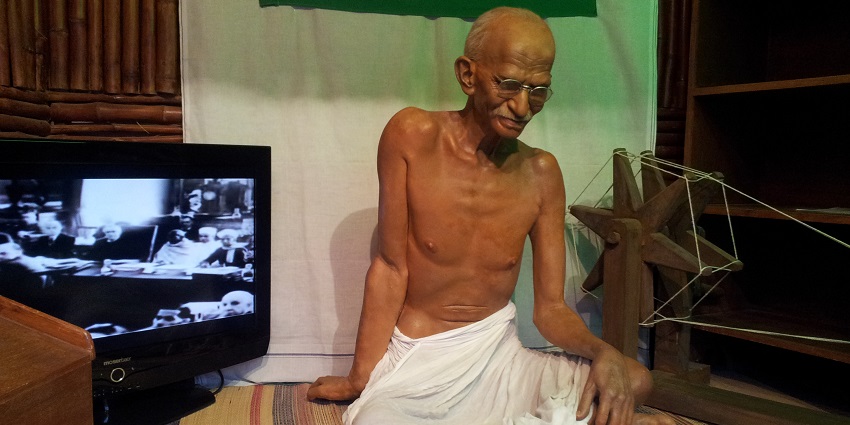 Wax statue of Mahatma Gandhi depicting his iconic look with a peaceful expression.