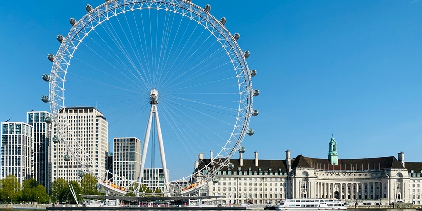 An image of the night view of the London Eye, a famous place to visit in London.