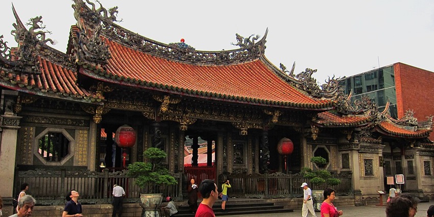 Historic temple in Taipei, featuring traditional architecture and artwork