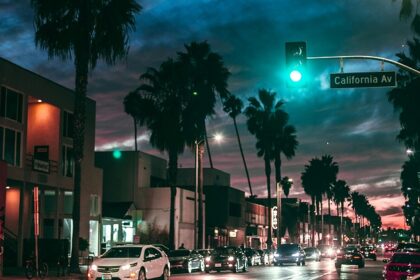 A mesmerising street view at night, showing nightlife in Los Angeles with colorful lighting.