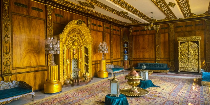 A beautiful room inside the Manial Palace Museum, which has impressive intricate carvings.