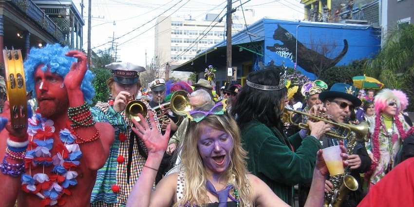 An image of a colourful Mardi Gras parade, one of the famous music events in the USA