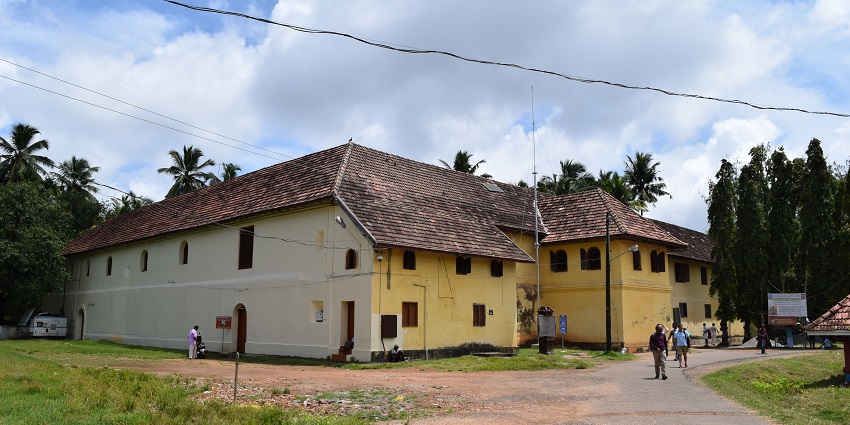 Historic palace showcasing Kerala’s royal history and traditional artwork.