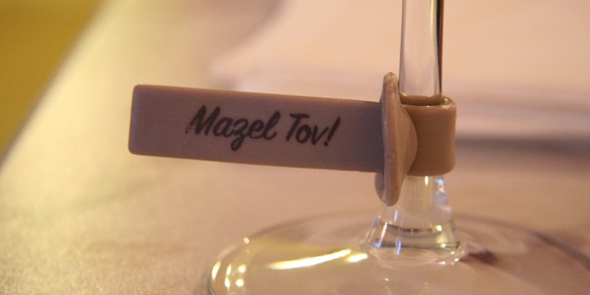 This picture shows the tag of the place Mazel Tov, a ruined bar and restaurant.