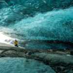 An image of the Mendenhall Ice Caves, a tourist attraction near Alaska.