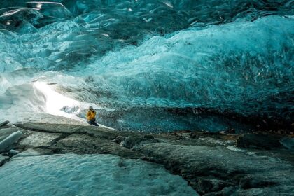 An image of the Mendenhall Ice Caves, a tourist attraction near Alaska.